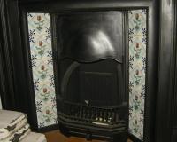 Edwardian cast iron fireplace insert