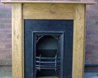Victorian antique cast iron fireplace insert with gothic detail