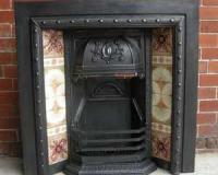 Reclaimed Arts and Crafts cast iron fireplace insert