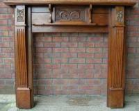 Victorian Arts and Crafts carved walnut fire surround